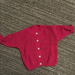 Baby’s Red Button-Up Sweater